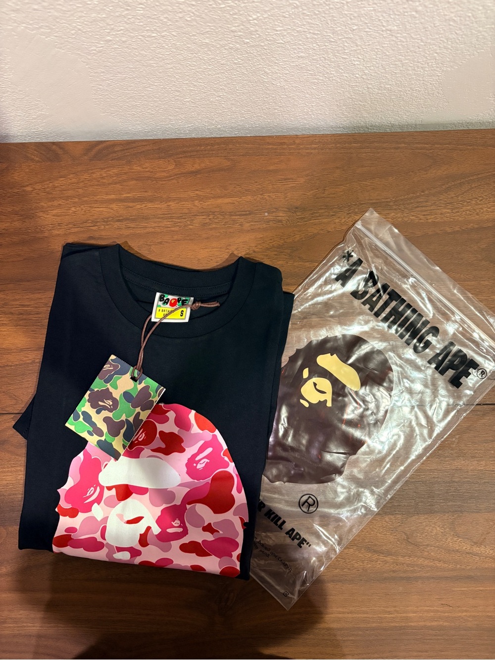 Bape Kids Black Tee with Pink & Red Camo Ape Head